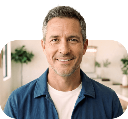 Portrait of an older man in a light-blue shirt