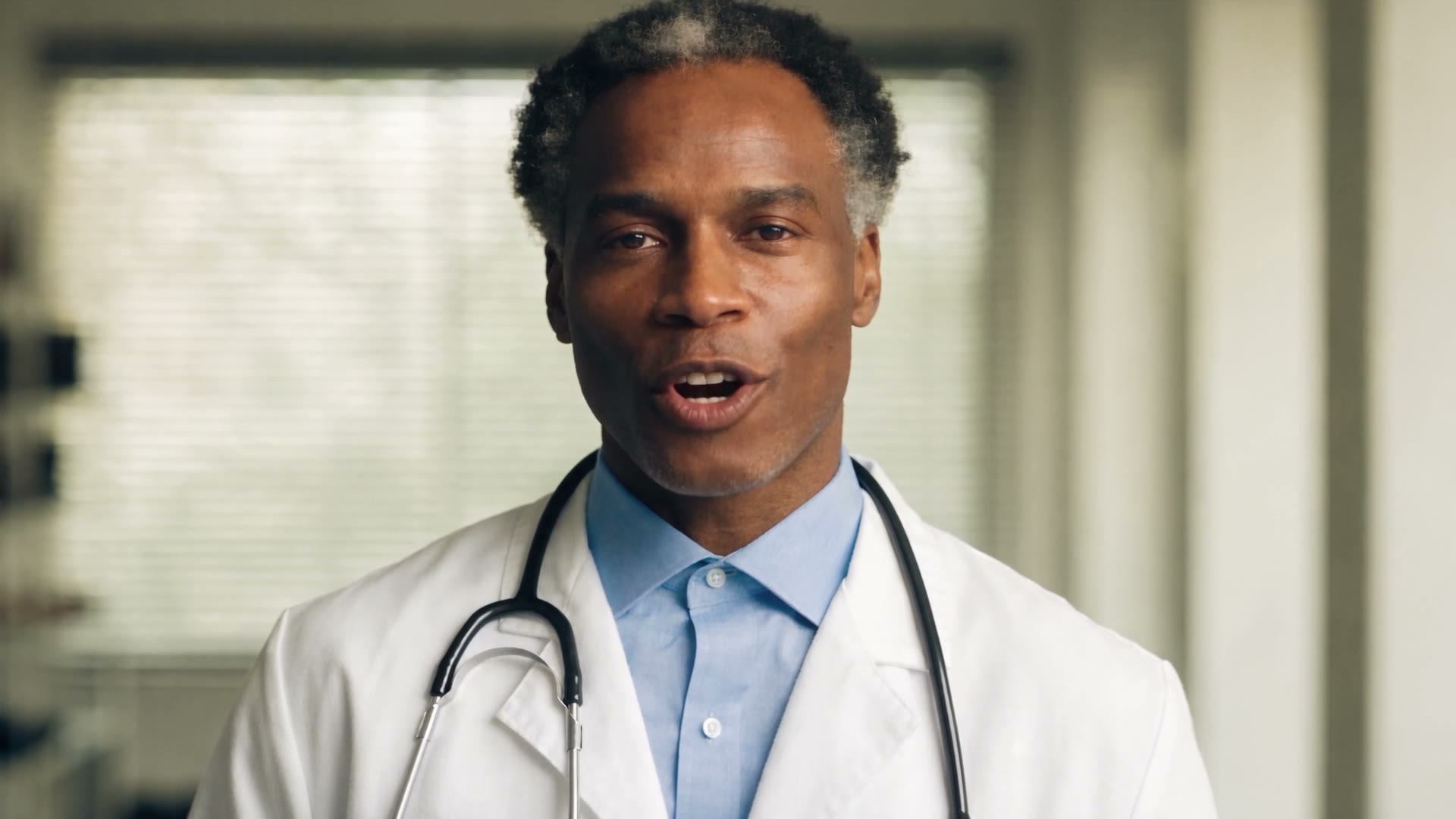 Doctor in a white coat with a stethoscope