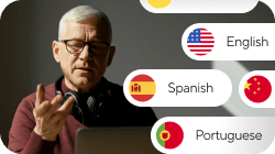 A man in glasses speaking at a laptop, with language options for English, Spanish, and Portuguese displayed next to him.