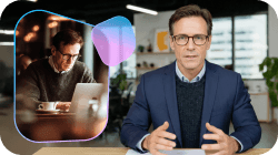 A man in a suit speaking, with an inset thought bubble showing him working on a laptop in a cafe.